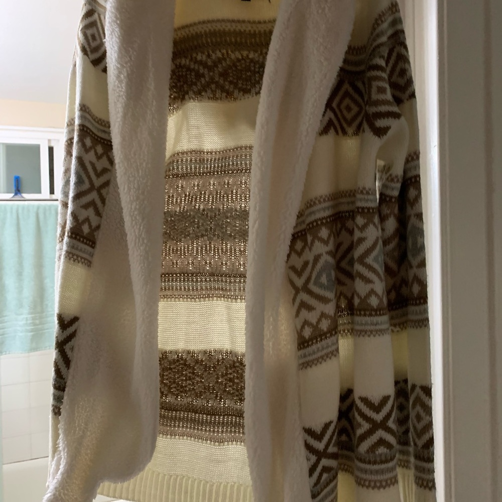 Never been worn fall/winter open furry coat.